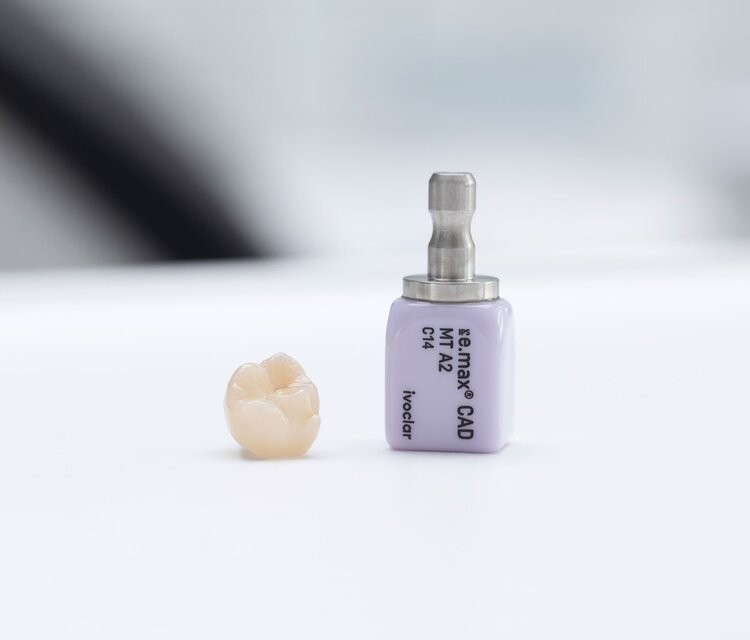 CEREC CAD ceramic and a finished dental restoration